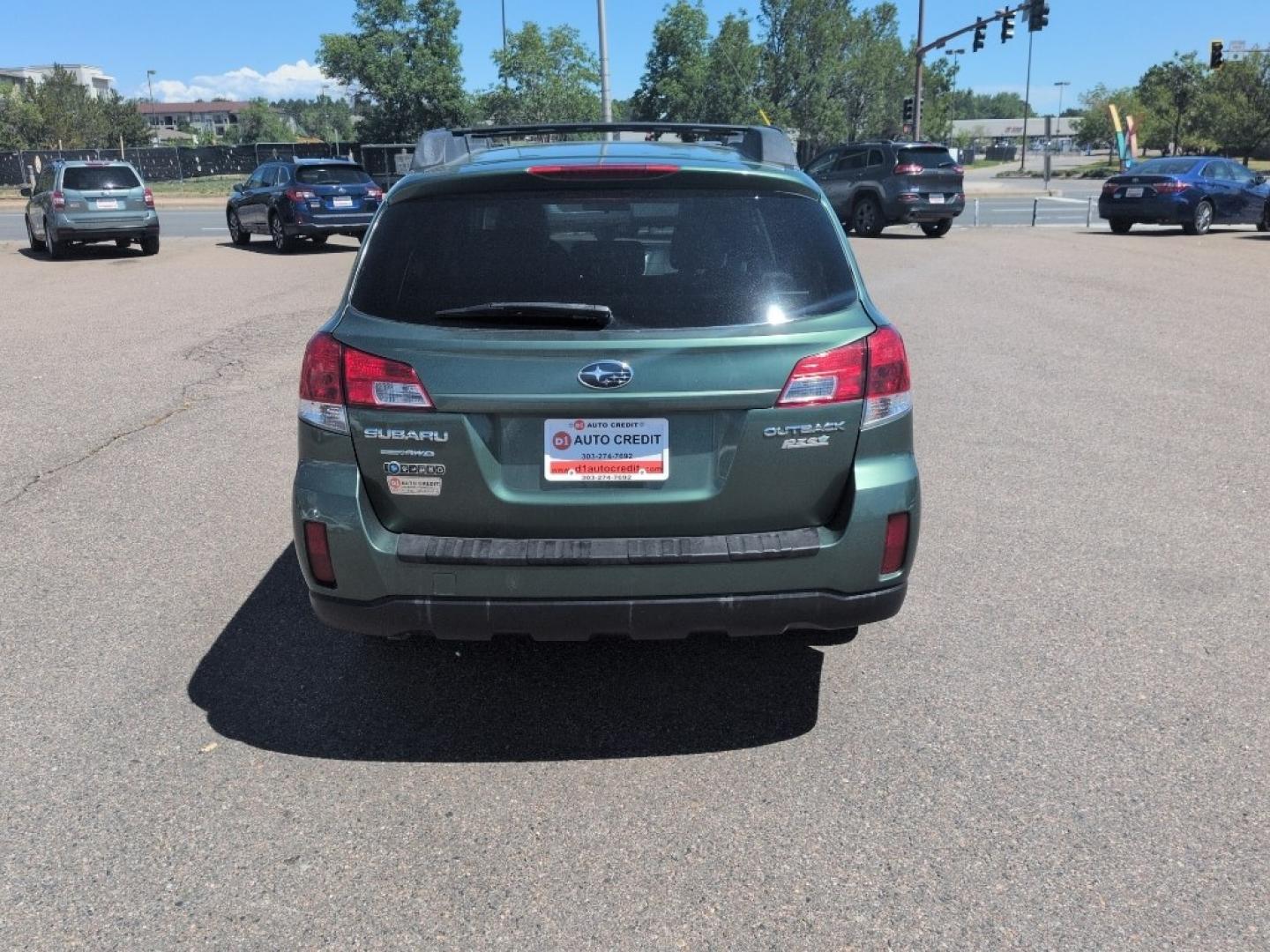 2010 GREEN Subaru Outback 2.5i Premium (4S4BRBBC7A3) with an 4 Cyl, 2.5L engine, Automatic transmission, located at 10890 W. Colfax Ave., Lakewood, CO, 80215, (303) 274-7692, 39.739914, -105.120132- Photo#5