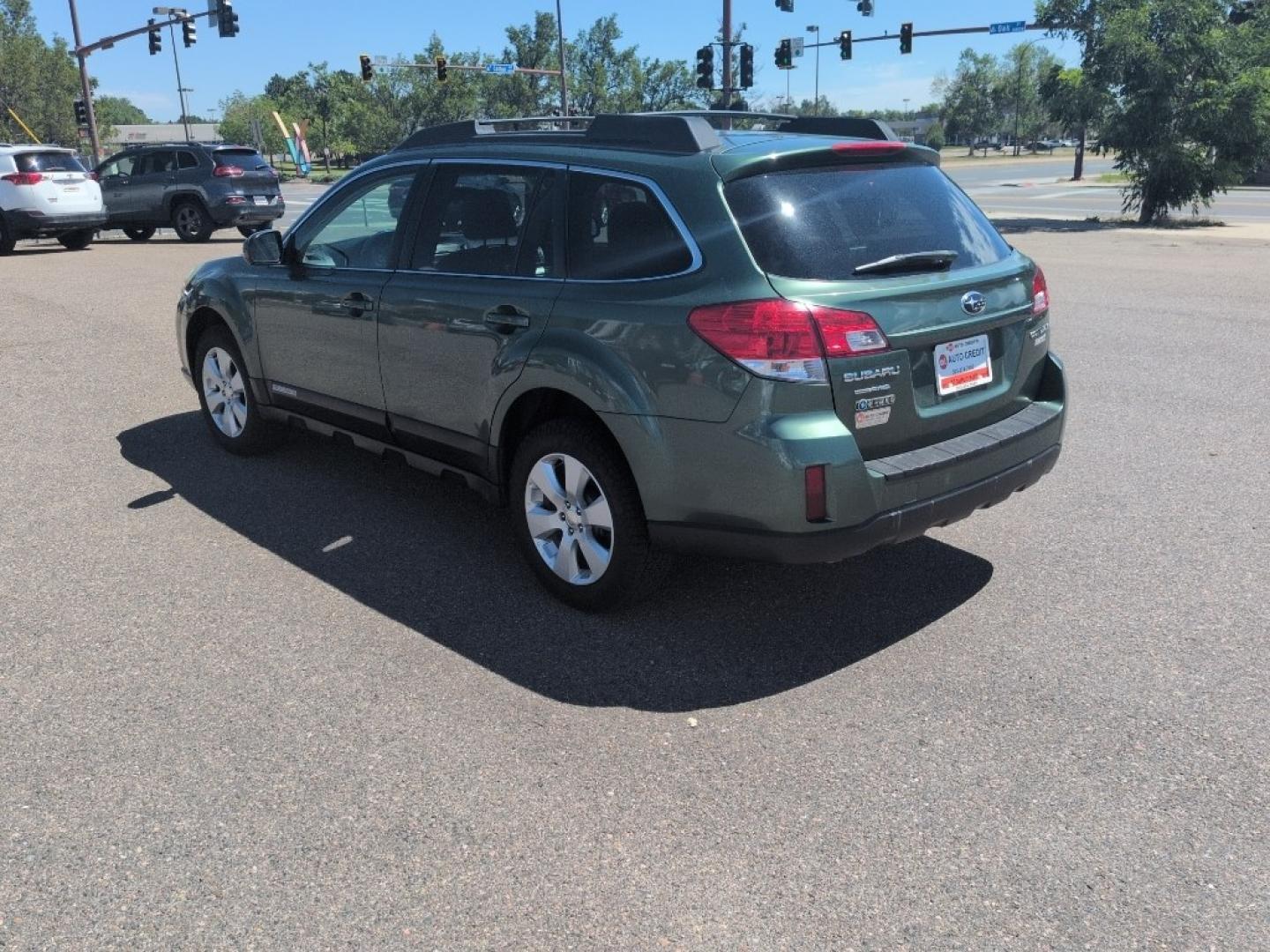 2010 GREEN Subaru Outback 2.5i Premium (4S4BRBBC7A3) with an 4 Cyl, 2.5L engine, Automatic transmission, located at 10890 W. Colfax Ave., Lakewood, CO, 80215, (303) 274-7692, 39.739914, -105.120132- Photo#6