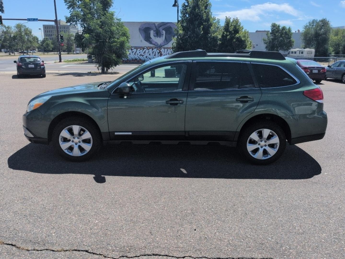 2010 GREEN Subaru Outback 2.5i Premium (4S4BRBBC7A3) with an 4 Cyl, 2.5L engine, Automatic transmission, located at 10890 W. Colfax Ave., Lakewood, CO, 80215, (303) 274-7692, 39.739914, -105.120132- Photo#7