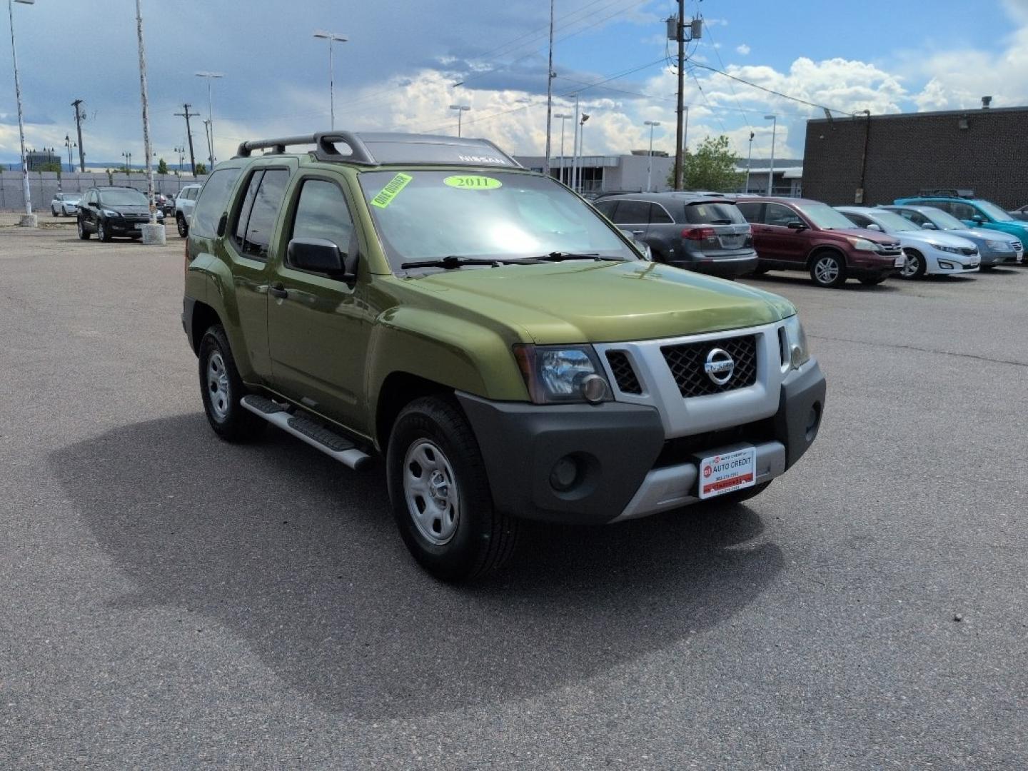 2011 GREEN Nissan Xterra X 4WD (5N1AN0NW1BC) with an V6, 4.0L engine, Automatic transmission, located at 10890 W. Colfax Ave., Lakewood, CO, 80215, (303) 274-7692, 39.739914, -105.120132- Photo#2