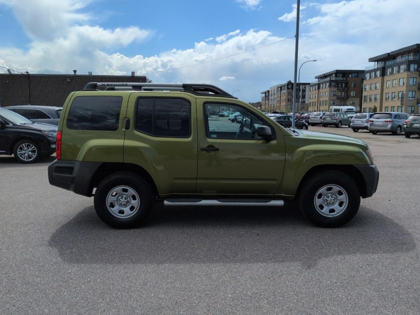 2011 GREEN Nissan Xterra X 4WD (5N1AN0NW1BC) with an V6, 4.0L engine, Automatic transmission, located at 10890 W. Colfax Ave., Lakewood, CO, 80215, (303) 274-7692, 39.739914, -105.120132- Photo#3