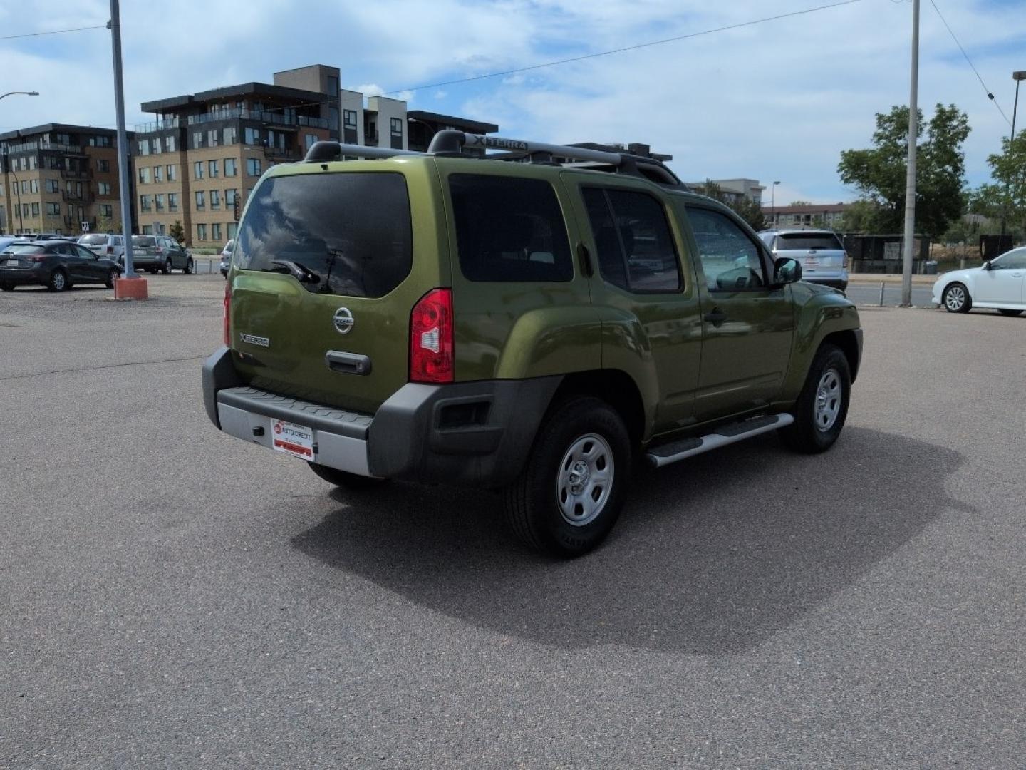 2011 GREEN Nissan Xterra X 4WD (5N1AN0NW1BC) with an V6, 4.0L engine, Automatic transmission, located at 10890 W. Colfax Ave., Lakewood, CO, 80215, (303) 274-7692, 39.739914, -105.120132- Photo#4