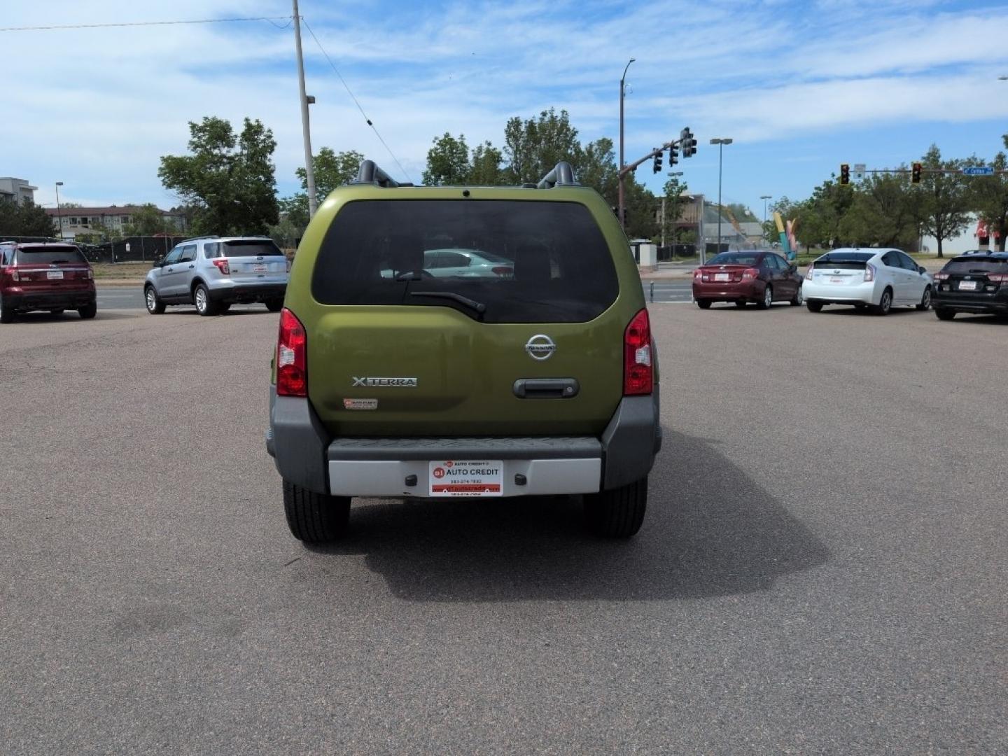 2011 GREEN Nissan Xterra X 4WD (5N1AN0NW1BC) with an V6, 4.0L engine, Automatic transmission, located at 10890 W. Colfax Ave., Lakewood, CO, 80215, (303) 274-7692, 39.739914, -105.120132- Photo#5