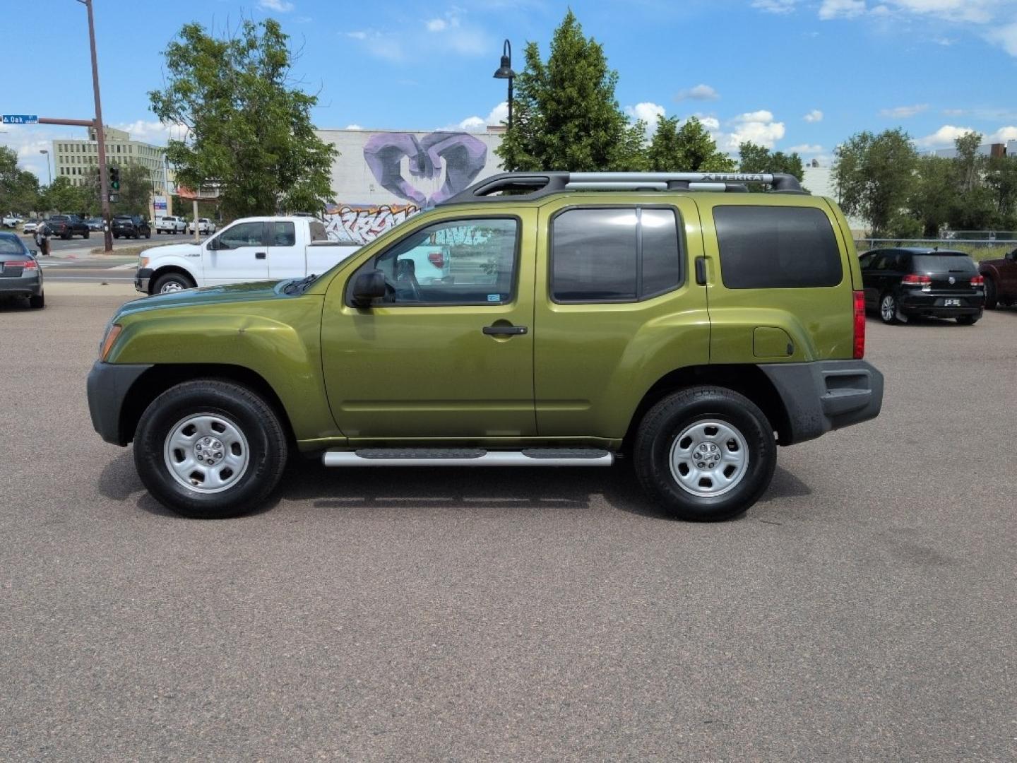 2011 GREEN Nissan Xterra X 4WD (5N1AN0NW1BC) with an V6, 4.0L engine, Automatic transmission, located at 10890 W. Colfax Ave., Lakewood, CO, 80215, (303) 274-7692, 39.739914, -105.120132- Photo#7