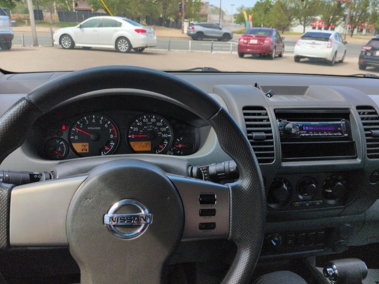 2011 GREEN Nissan Xterra X 4WD (5N1AN0NW1BC) with an V6, 4.0L engine, Automatic transmission, located at 10890 W. Colfax Ave., Lakewood, CO, 80215, (303) 274-7692, 39.739914, -105.120132- Photo#10
