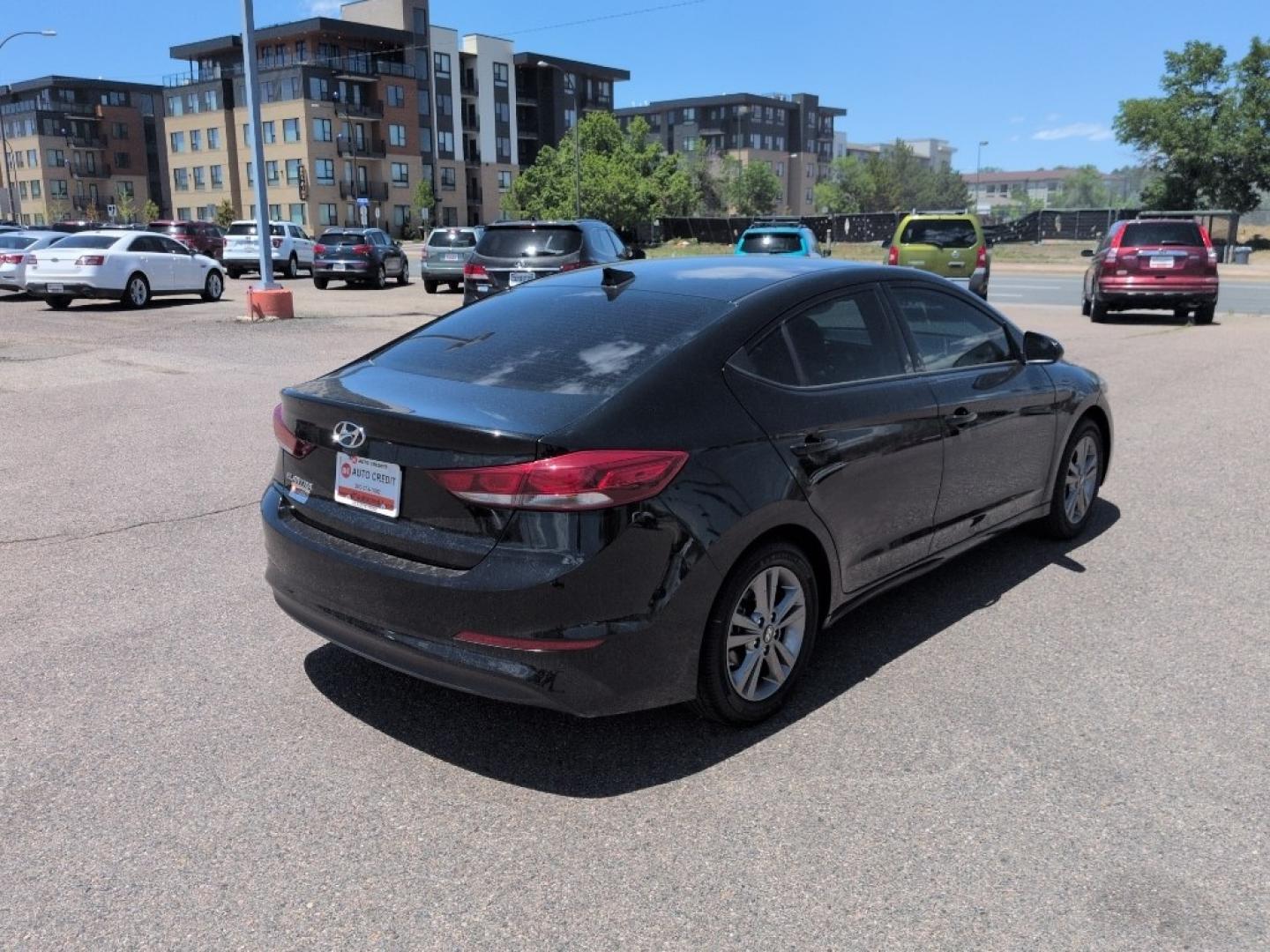 2018 BLACK Hyundai Elantra LIMITED (5NPD84LF8JH) with an 4 Cyl, 2.0L engine, Automatic transmission, located at 10890 W. Colfax Ave., Lakewood, CO, 80215, (303) 274-7692, 39.739914, -105.120132- Photo#4