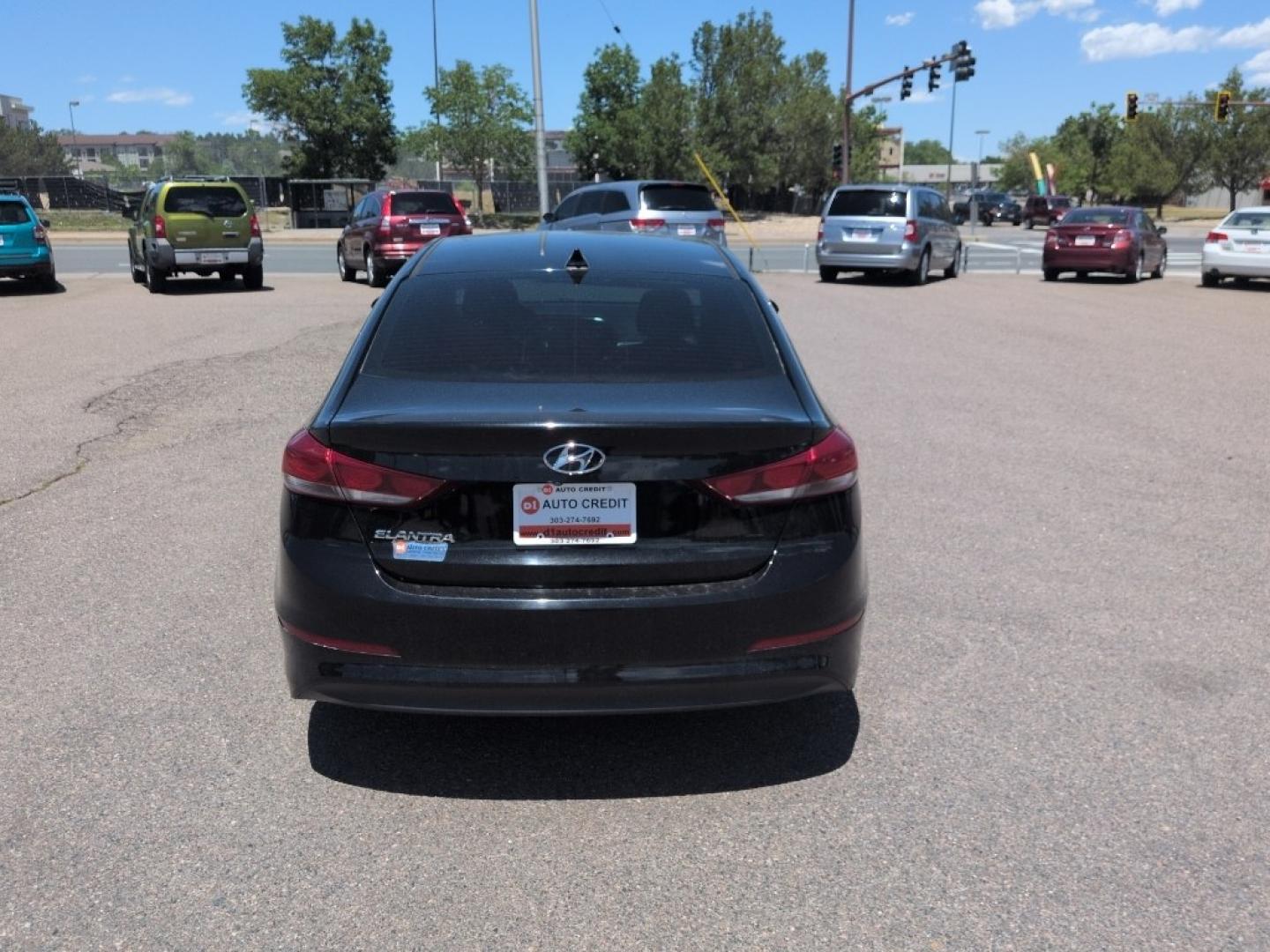 2018 BLACK Hyundai Elantra LIMITED (5NPD84LF8JH) with an 4 Cyl, 2.0L engine, Automatic transmission, located at 10890 W. Colfax Ave., Lakewood, CO, 80215, (303) 274-7692, 39.739914, -105.120132- Photo#5