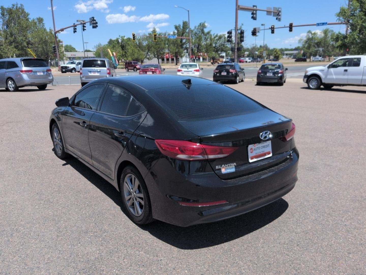 2018 BLACK Hyundai Elantra LIMITED (5NPD84LF8JH) with an 4 Cyl, 2.0L engine, Automatic transmission, located at 10890 W. Colfax Ave., Lakewood, CO, 80215, (303) 274-7692, 39.739914, -105.120132- Photo#6