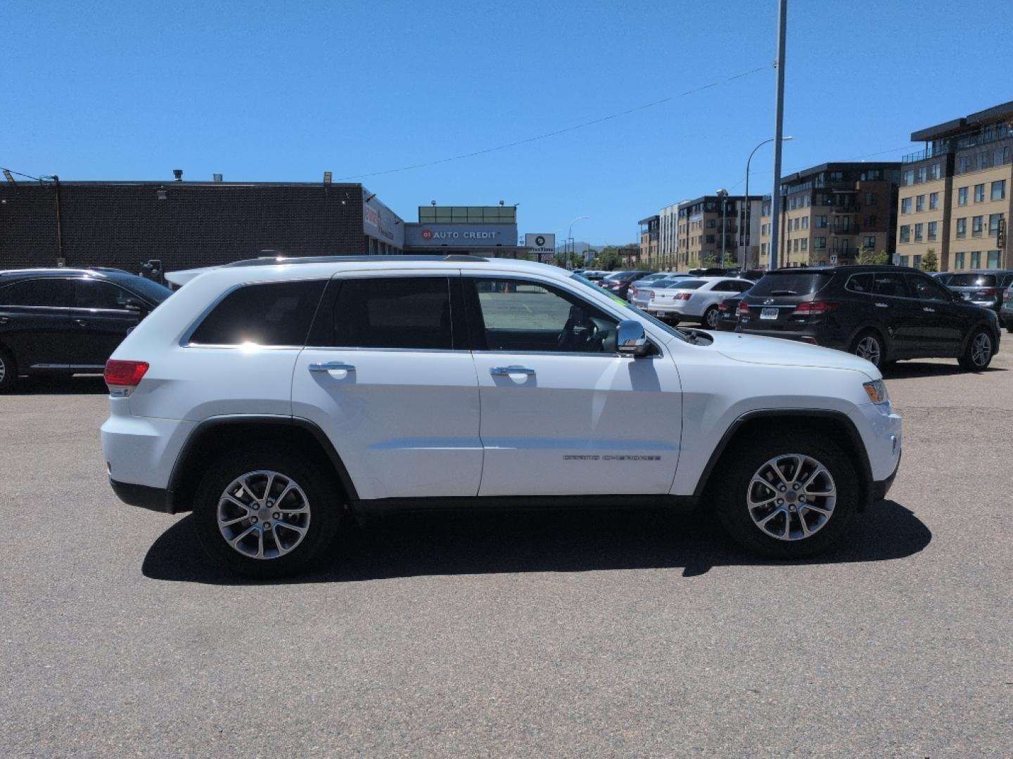 2015 WHITE Jeep Grand Cherokee Limited (1C4RJFBG9FC) with an V6, 3.6L engine, Automatic transmission, located at 10890 W. Colfax Ave., Lakewood, CO, 80215, (303) 274-7692, 39.739914, -105.120132- Photo#3