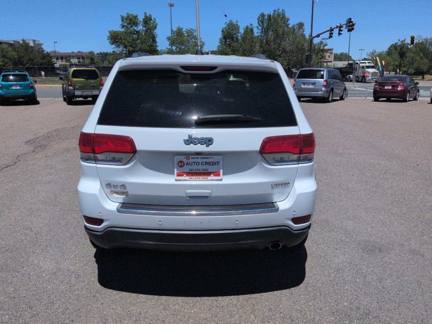 2015 WHITE Jeep Grand Cherokee Limited (1C4RJFBG9FC) with an V6, 3.6L engine, Automatic transmission, located at 10890 W. Colfax Ave., Lakewood, CO, 80215, (303) 274-7692, 39.739914, -105.120132- Photo#5