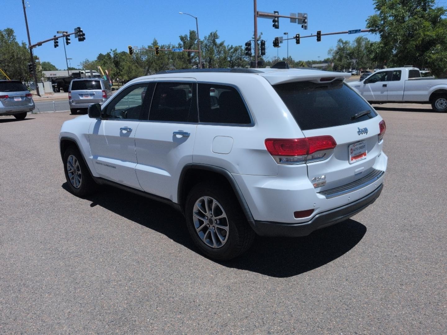 2015 WHITE Jeep Grand Cherokee Limited (1C4RJFBG9FC) with an V6, 3.6L engine, Automatic transmission, located at 10890 W. Colfax Ave., Lakewood, CO, 80215, (303) 274-7692, 39.739914, -105.120132- Photo#6