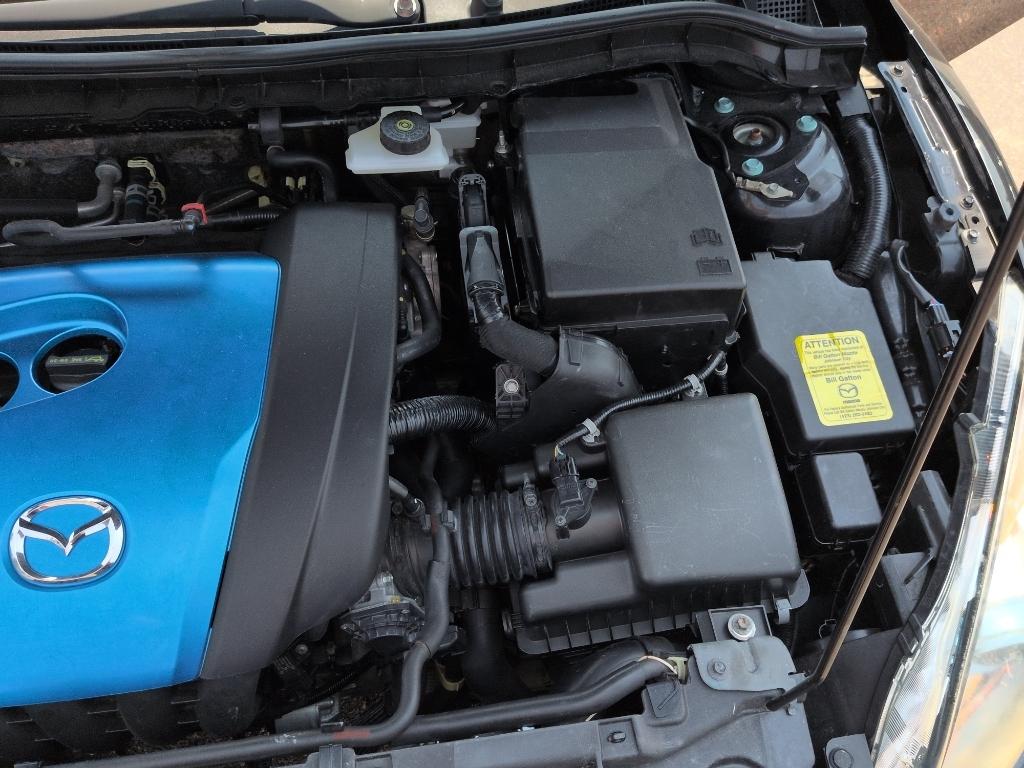2012 BLACK Mazda Mazda3 i Touring w/SKYACTIV-G (JM1BL1V70C1) with an 4 Cyl, 2.0L engine, Automatic transmission, located at 10890 W. Colfax Ave., Lakewood, CO, 80215, (303) 274-7692, 39.739914, -105.120132- Photo#24