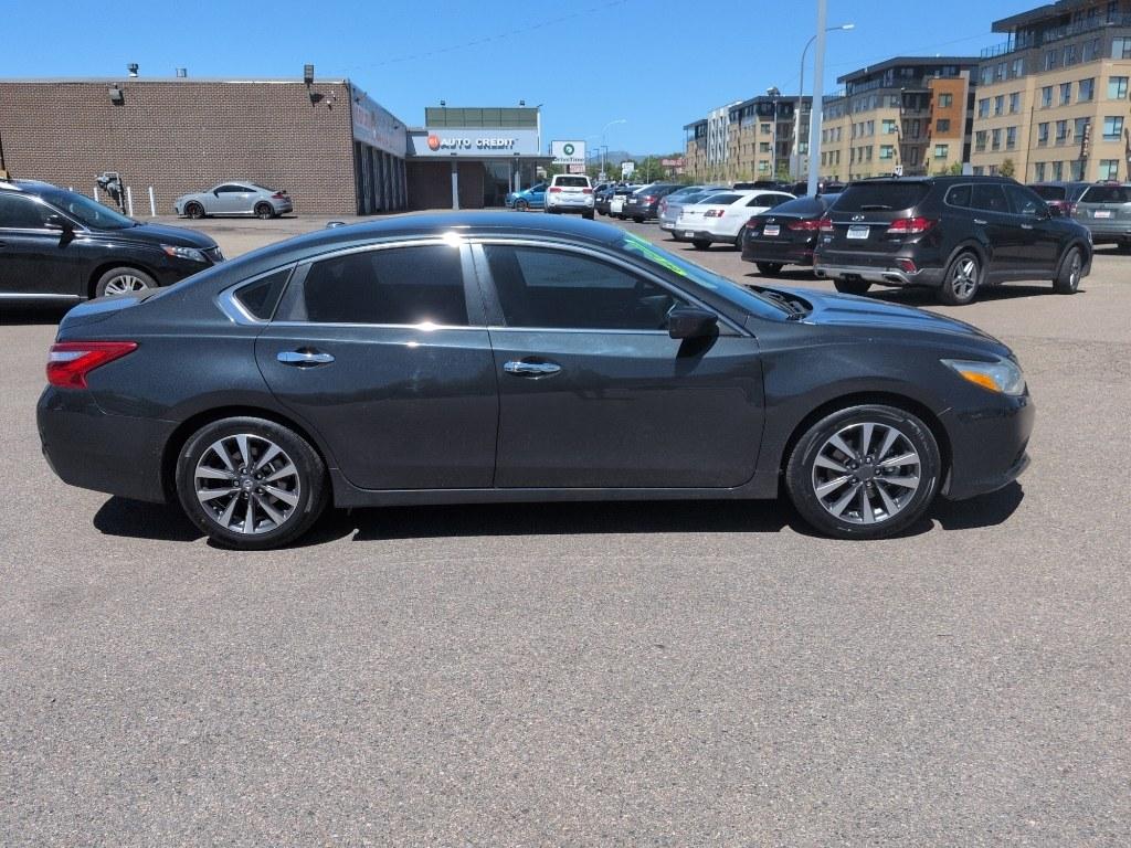 2016 BLUE Nissan Altima 2.5 S (1N4AL3AP1GC) with an 4 Cyl, 2.5L engine, Automatic transmission, located at 10890 W. Colfax Ave., Lakewood, CO, 80215, (303) 274-7692, 39.739914, -105.120132- Photo#3