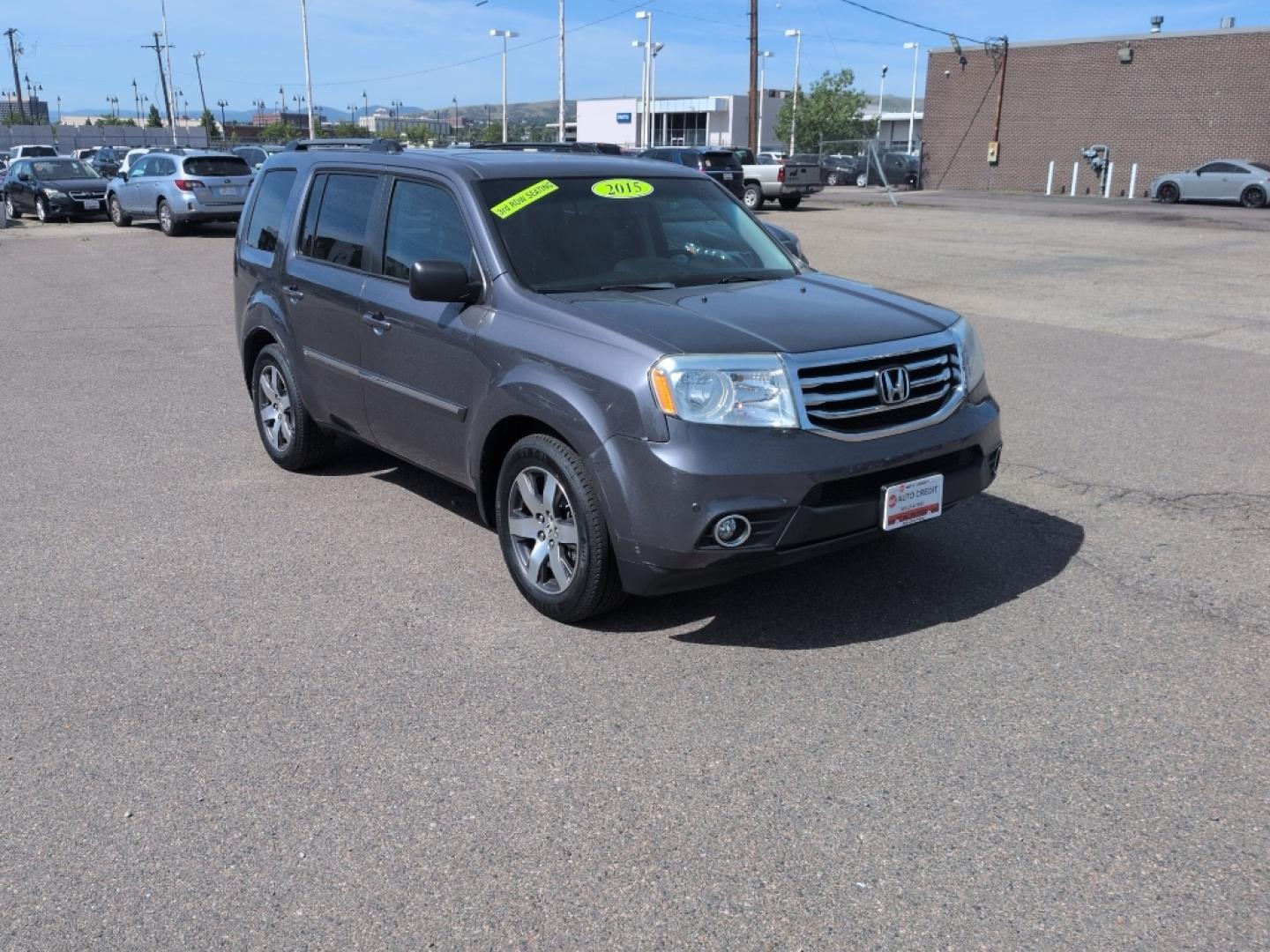2015 GRAY Honda Pilot Touring-RES (5FNYF4H95FB) with an V6, 3.5L engine, Automatic transmission, located at 10890 W. Colfax Ave., Lakewood, CO, 80215, (303) 274-7692, 39.739914, -105.120132- Photo#2
