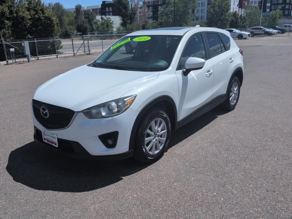 2014 WHITE Mazda CX-5 Touring (JM3KE2CY6E0) with an 4 Cyl, 2.5L engine, Automatic transmission, located at 10890 W. Colfax Ave., Lakewood, CO, 80215, (303) 274-7692, 39.739914, -105.120132- Photo#0
