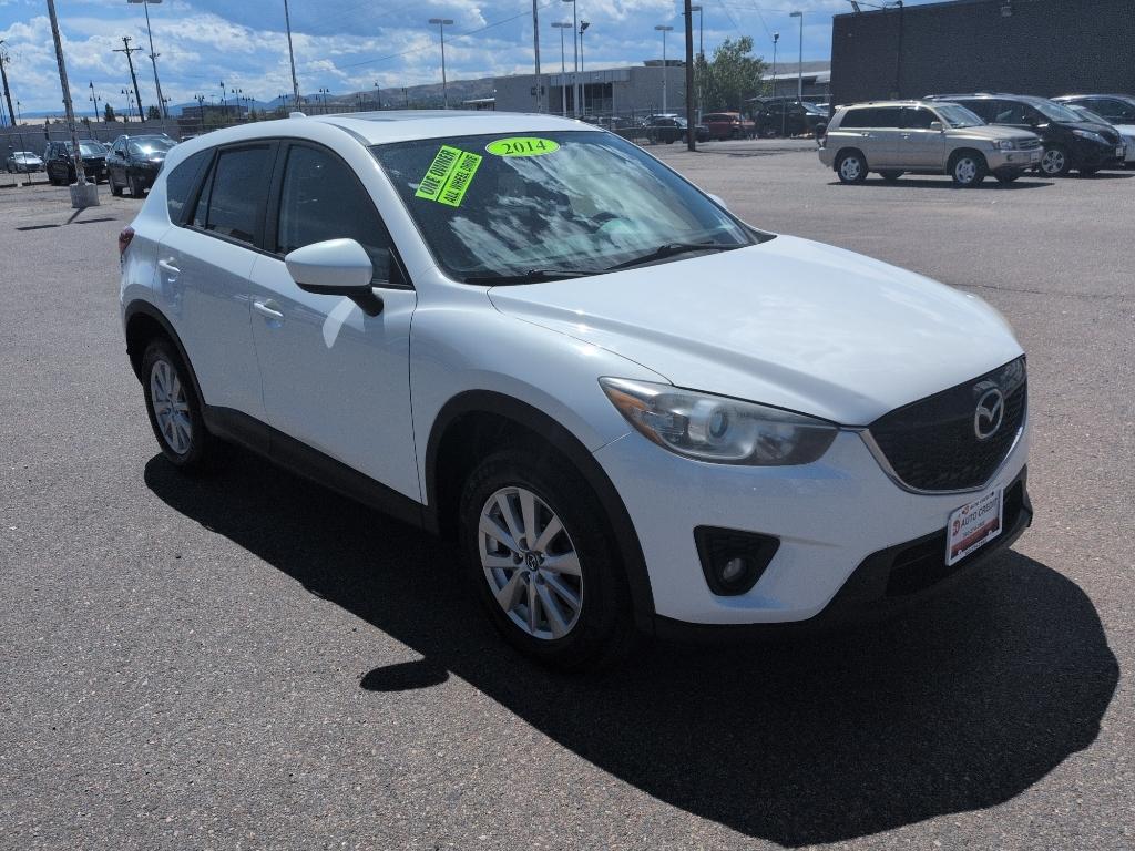 2014 WHITE Mazda CX-5 Touring (JM3KE2CY6E0) with an 4 Cyl, 2.5L engine, Automatic transmission, located at 10890 W. Colfax Ave., Lakewood, CO, 80215, (303) 274-7692, 39.739914, -105.120132- Photo#2