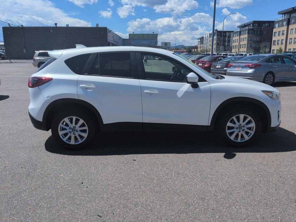 2014 WHITE Mazda CX-5 Touring (JM3KE2CY6E0) with an 4 Cyl, 2.5L engine, Automatic transmission, located at 10890 W. Colfax Ave., Lakewood, CO, 80215, (303) 274-7692, 39.739914, -105.120132- Photo#3