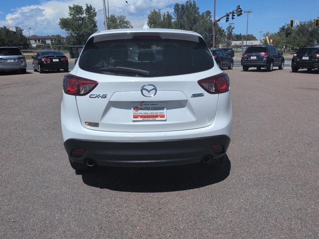 2014 WHITE Mazda CX-5 Touring (JM3KE2CY6E0) with an 4 Cyl, 2.5L engine, Automatic transmission, located at 10890 W. Colfax Ave., Lakewood, CO, 80215, (303) 274-7692, 39.739914, -105.120132- Photo#5