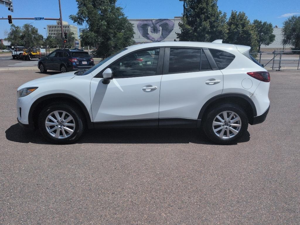 2014 WHITE Mazda CX-5 Touring (JM3KE2CY6E0) with an 4 Cyl, 2.5L engine, Automatic transmission, located at 10890 W. Colfax Ave., Lakewood, CO, 80215, (303) 274-7692, 39.739914, -105.120132- Photo#7