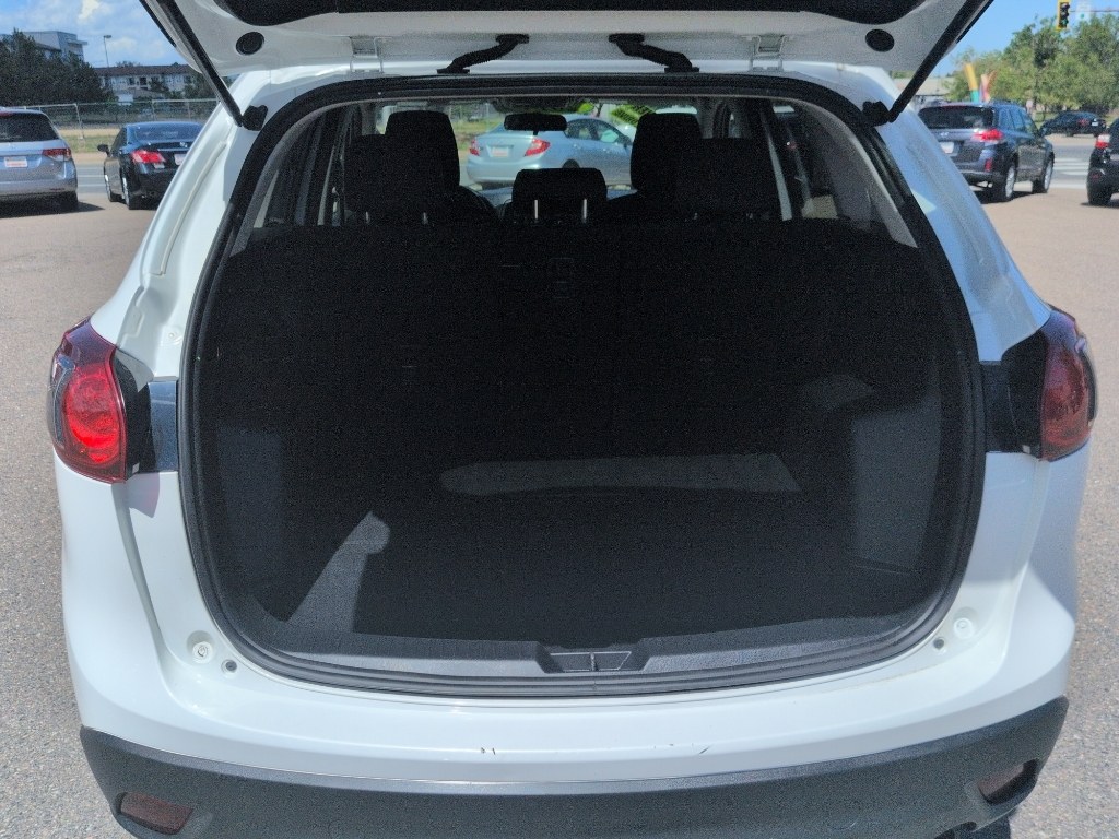 2014 WHITE Mazda CX-5 Touring (JM3KE2CY6E0) with an 4 Cyl, 2.5L engine, Automatic transmission, located at 10890 W. Colfax Ave., Lakewood, CO, 80215, (303) 274-7692, 39.739914, -105.120132- Photo#21