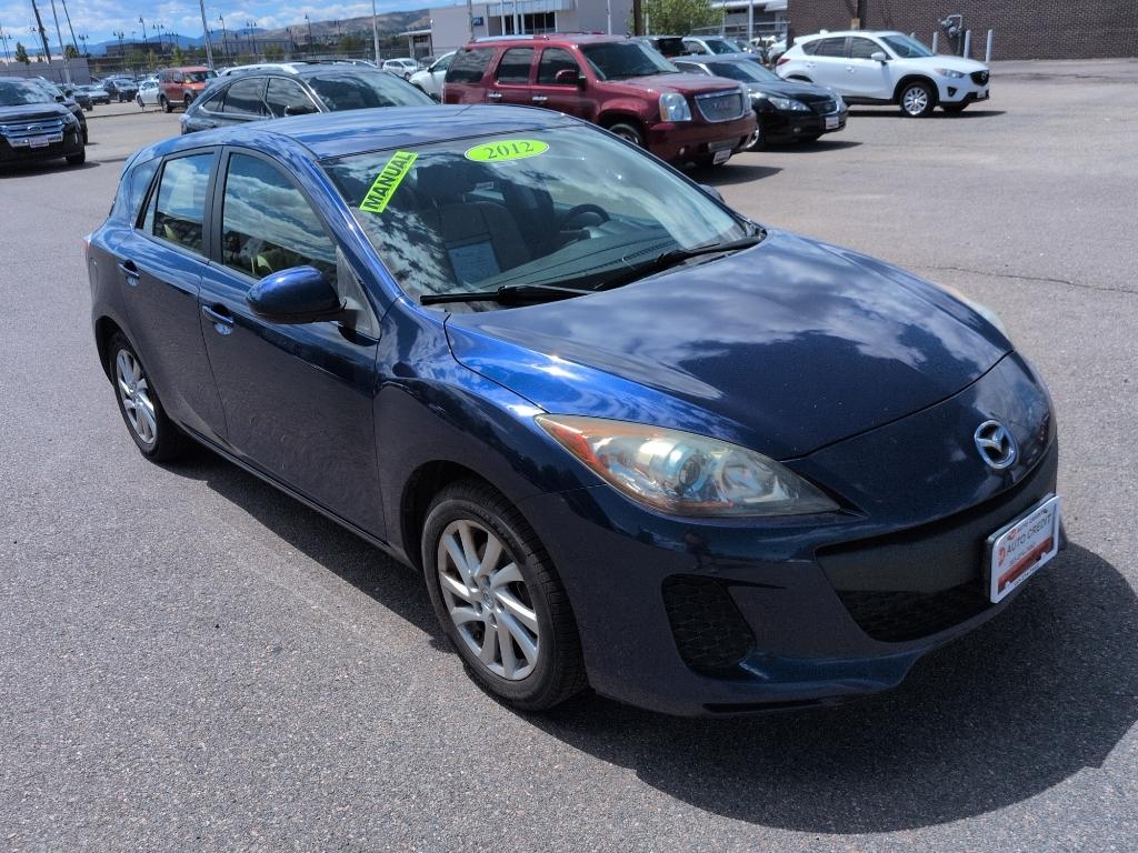 2012 BLUE Mazda Mazda3 i Touring w/SKYACTIV-G (JM1BL1L72C1) with an 4 Cyl, 2.0L engine, Automatic transmission, located at 10890 W. Colfax Ave., Lakewood, CO, 80215, (303) 274-7692, 39.739914, -105.120132- Photo#2