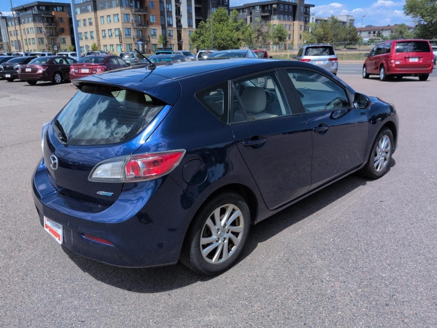 2012 BLUE Mazda Mazda3 i Touring w/SKYACTIV-G (JM1BL1L72C1) with an 4 Cyl, 2.0L engine, Manual 6-Speed transmission, located at 10890 W. Colfax Ave., Lakewood, CO, 80215, (303) 274-7692, 39.739914, -105.120132- Photo#4