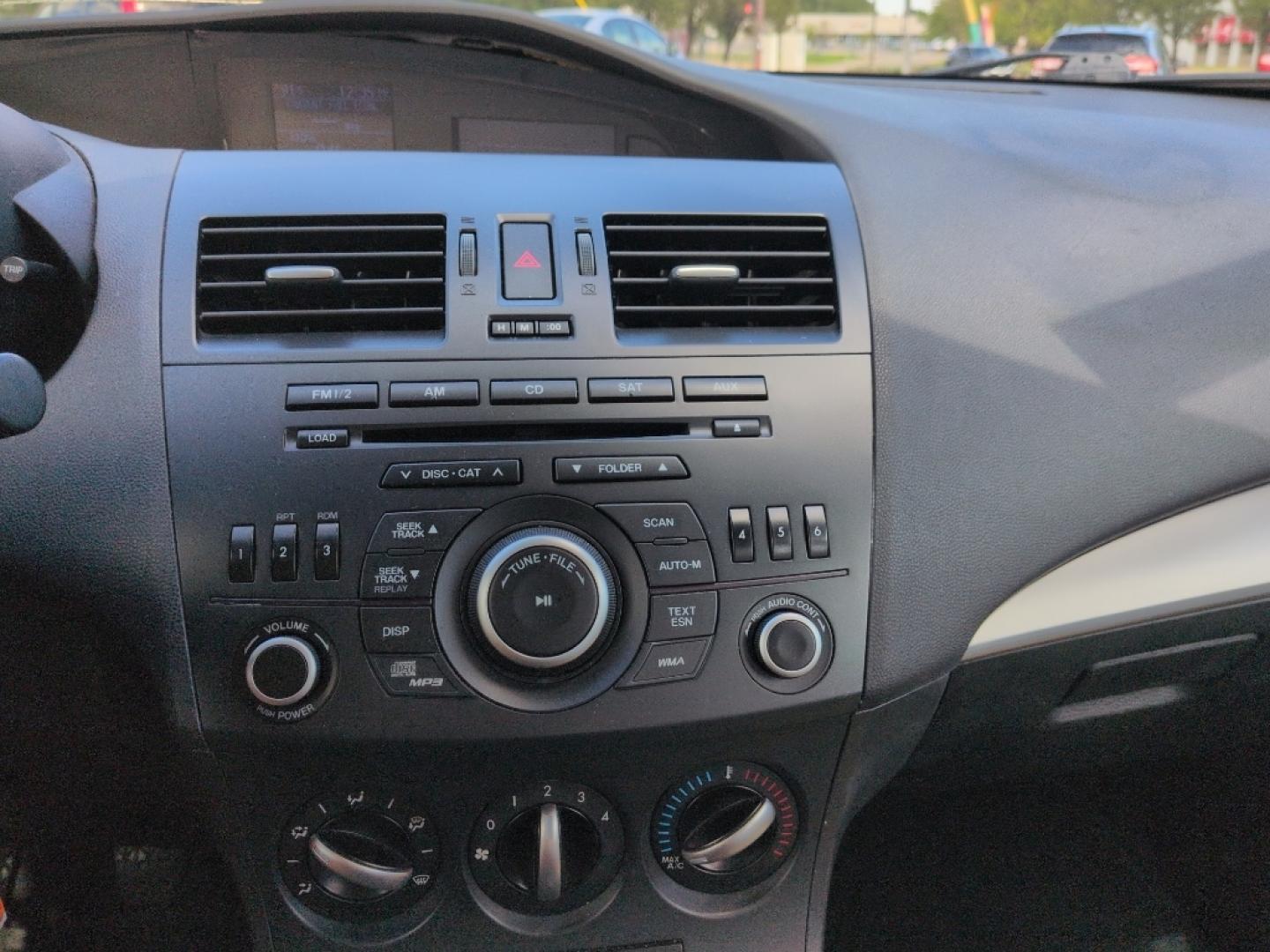 2012 BLUE Mazda Mazda3 i Touring w/SKYACTIV-G (JM1BL1L72C1) with an 4 Cyl, 2.0L engine, Manual 6-Speed transmission, located at 10890 W. Colfax Ave., Lakewood, CO, 80215, (303) 274-7692, 39.739914, -105.120132- Photo#12