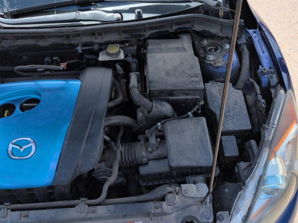 2012 BLUE Mazda Mazda3 i Touring w/SKYACTIV-G (JM1BL1L72C1) with an 4 Cyl, 2.0L engine, Automatic transmission, located at 10890 W. Colfax Ave., Lakewood, CO, 80215, (303) 274-7692, 39.739914, -105.120132- Photo#24