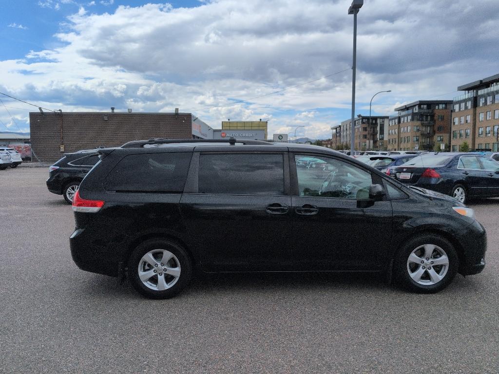 2011 BLACK Toyota Sienna LE 8-PASS V6 (5TDKK3DC7BS) with an V6, 3.5L engine, Automatic transmission, located at 10890 W. Colfax Ave., Lakewood, CO, 80215, (303) 274-7692, 39.739914, -105.120132- Photo#3