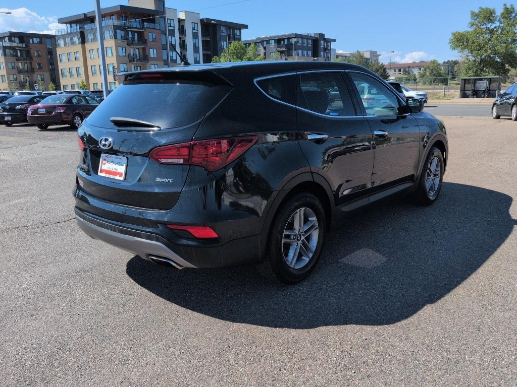 2018 BLACK Hyundai Santa Fe Sport Base (5XYZT3LB0JG) with an 4 Cyl, 2.4L engine, Automatic transmission, located at 10890 W. Colfax Ave., Lakewood, CO, 80215, (303) 274-7692, 39.739914, -105.120132- Photo#4