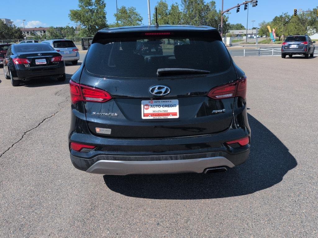 2018 BLACK Hyundai Santa Fe Sport Base (5XYZT3LB0JG) with an 4 Cyl, 2.4L engine, Automatic transmission, located at 10890 W. Colfax Ave., Lakewood, CO, 80215, (303) 274-7692, 39.739914, -105.120132- Photo#5