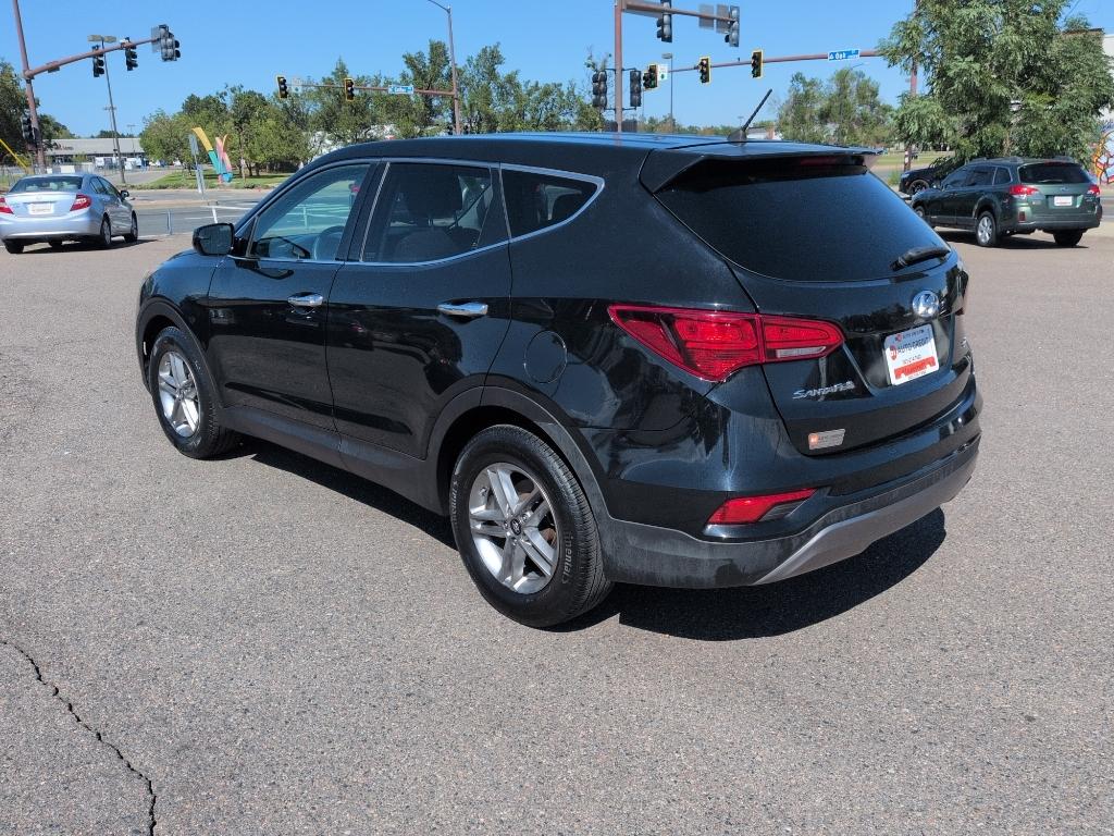 2018 BLACK Hyundai Santa Fe Sport Base (5XYZT3LB0JG) with an 4 Cyl, 2.4L engine, Automatic transmission, located at 10890 W. Colfax Ave., Lakewood, CO, 80215, (303) 274-7692, 39.739914, -105.120132- Photo#6