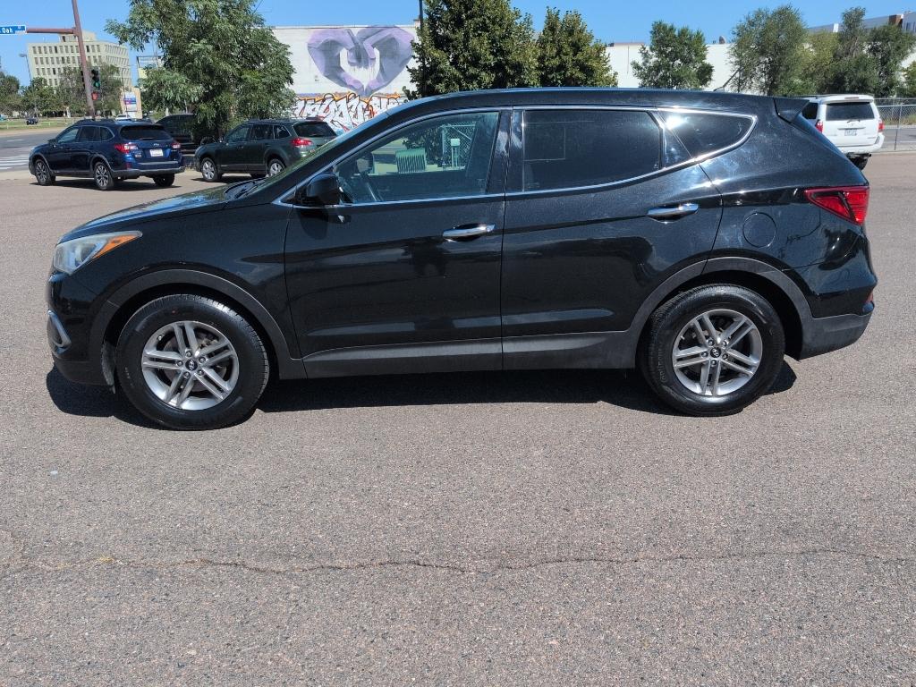 2018 BLACK Hyundai Santa Fe Sport Base (5XYZT3LB0JG) with an 4 Cyl, 2.4L engine, Automatic transmission, located at 10890 W. Colfax Ave., Lakewood, CO, 80215, (303) 274-7692, 39.739914, -105.120132- Photo#7