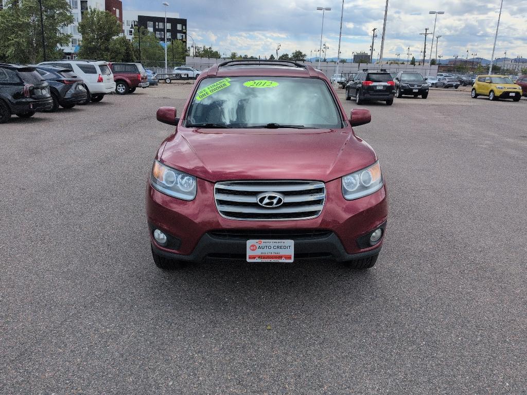 2012 red Hyundai Santa Fe LIMITED 3.5 FWD (5XYZK4AG3CG) with an V6, 3.5L engine, Automatic transmission, located at 10890 W. Colfax Ave., Lakewood, CO, 80215, (303) 274-7692, 39.739914, -105.120132- Photo#1
