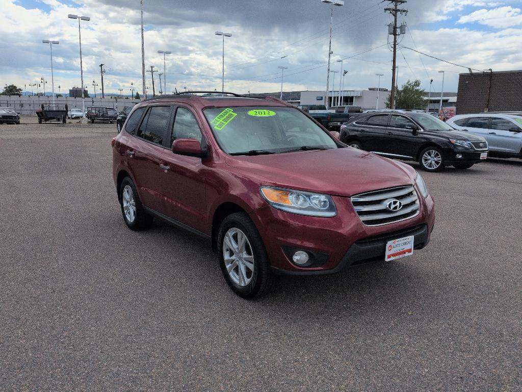 2012 red Hyundai Santa Fe LIMITED 3.5 FWD (5XYZK4AG3CG) with an V6, 3.5L engine, Automatic transmission, located at 10890 W. Colfax Ave., Lakewood, CO, 80215, (303) 274-7692, 39.739914, -105.120132- Photo#2