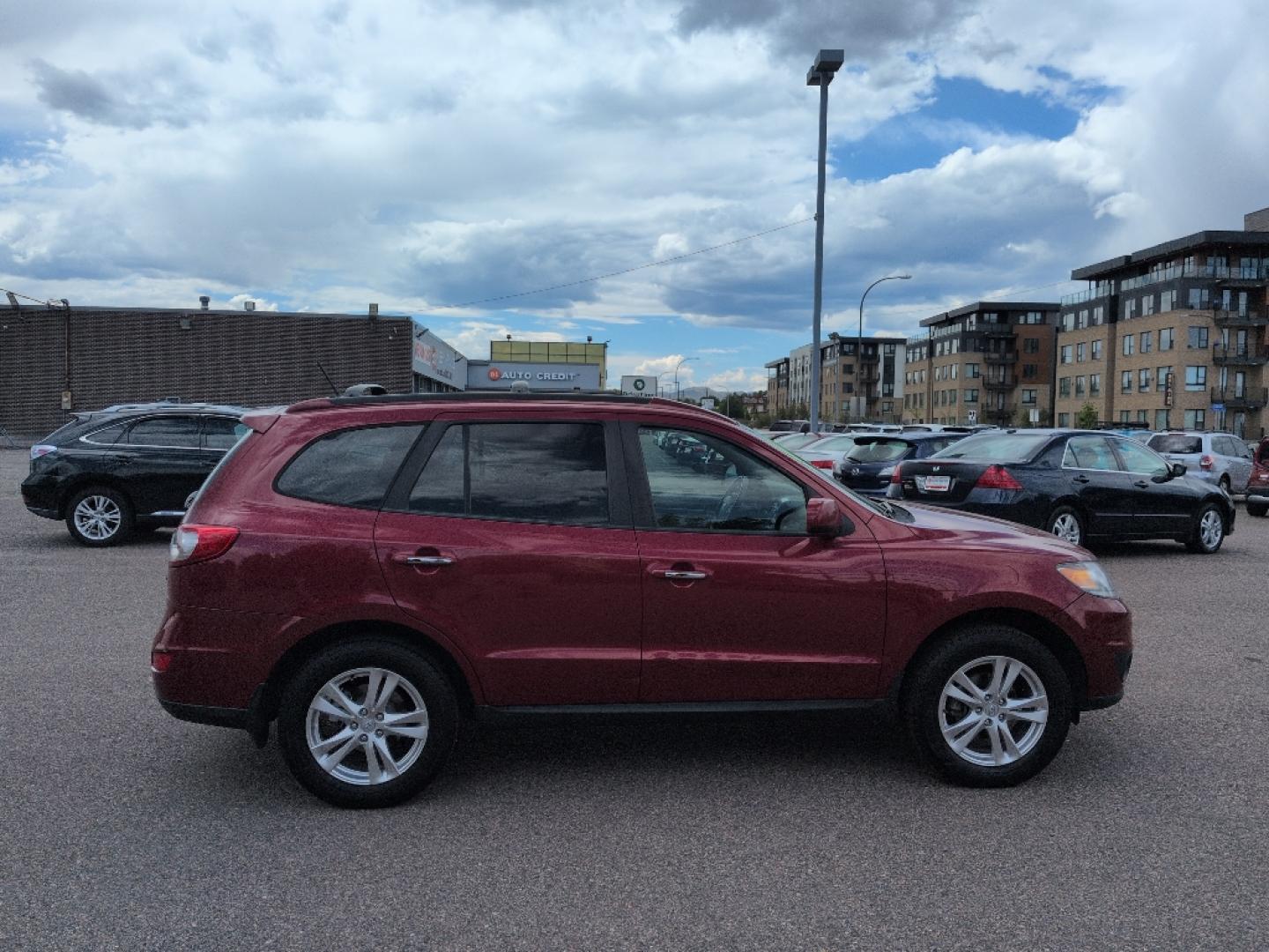 2012 red Hyundai Santa Fe LIMITED 3.5 FWD (5XYZK4AG3CG) with an V6, 3.5L engine, Automatic transmission, located at 10890 W. Colfax Ave., Lakewood, CO, 80215, (303) 274-7692, 39.739914, -105.120132- Photo#3