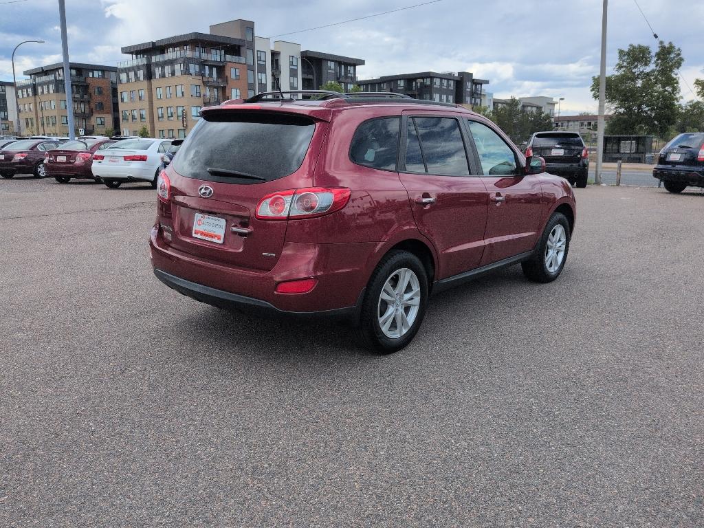 2012 red Hyundai Santa Fe LIMITED 3.5 FWD (5XYZK4AG3CG) with an V6, 3.5L engine, Automatic transmission, located at 10890 W. Colfax Ave., Lakewood, CO, 80215, (303) 274-7692, 39.739914, -105.120132- Photo#4
