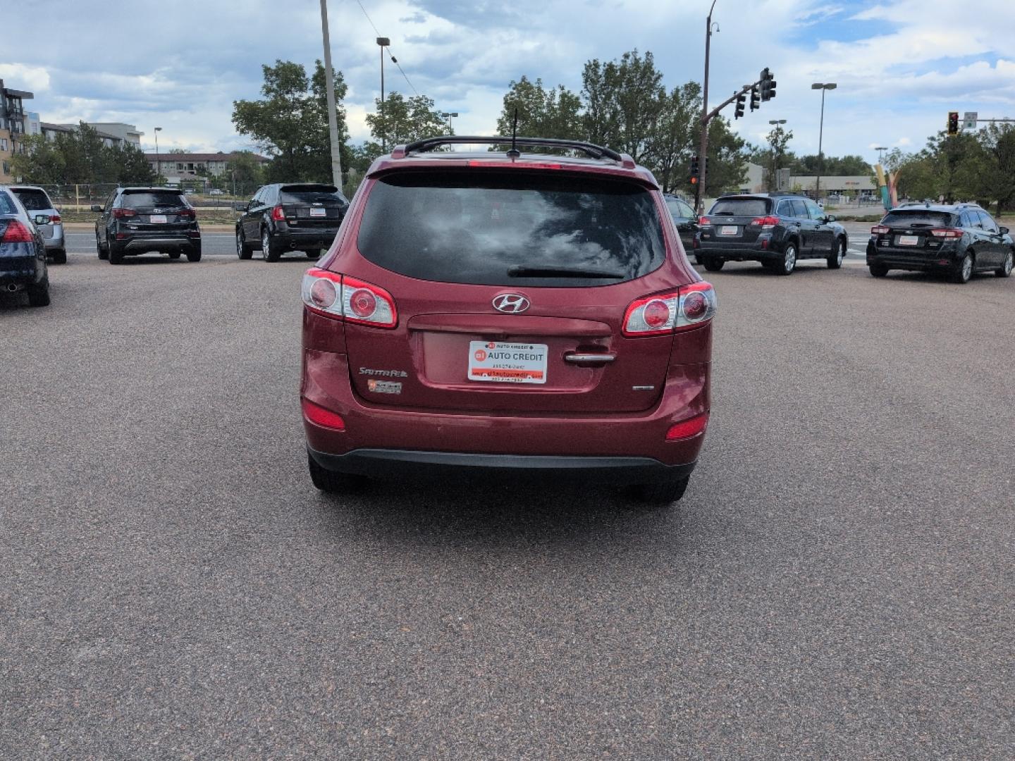 2012 red Hyundai Santa Fe LIMITED 3.5 FWD (5XYZK4AG3CG) with an V6, 3.5L engine, Automatic transmission, located at 10890 W. Colfax Ave., Lakewood, CO, 80215, (303) 274-7692, 39.739914, -105.120132- Photo#5