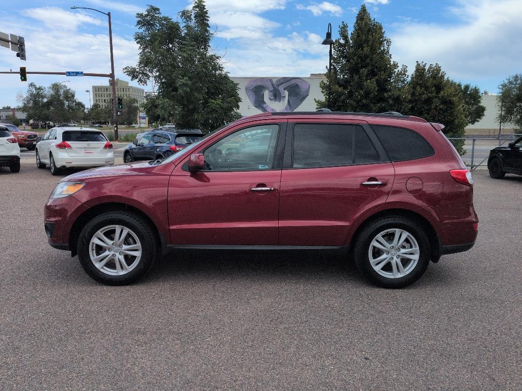 2012 red Hyundai Santa Fe LIMITED 3.5 FWD (5XYZK4AG3CG) with an V6, 3.5L engine, Automatic transmission, located at 10890 W. Colfax Ave., Lakewood, CO, 80215, (303) 274-7692, 39.739914, -105.120132- Photo#7