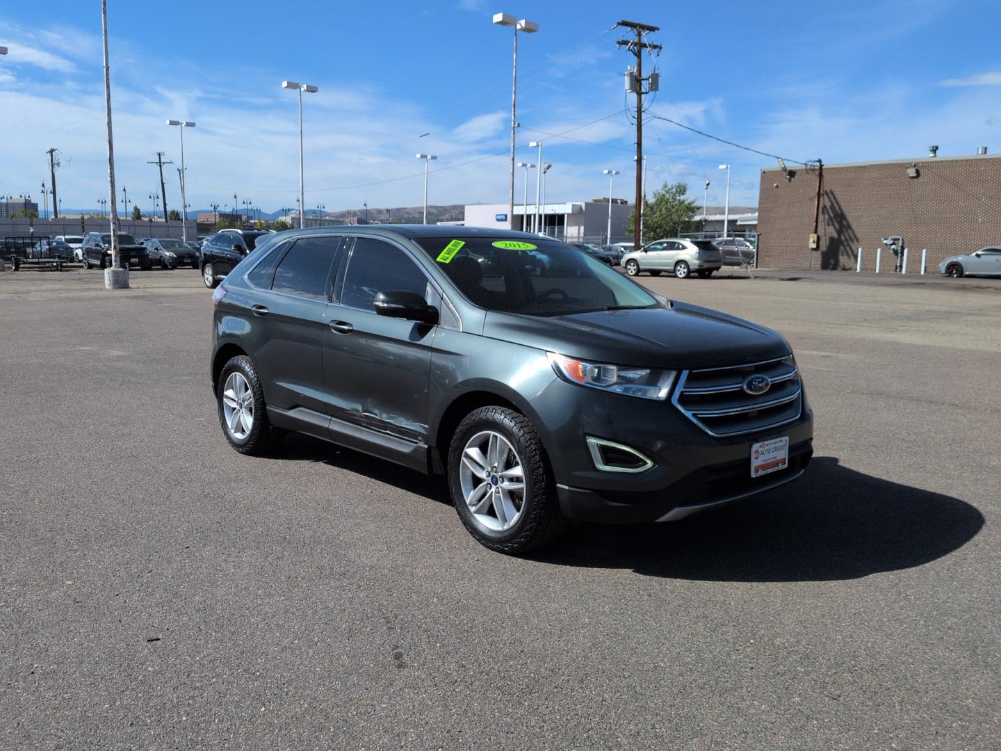 2015 GRAY Ford Edge SEL (2FMTK4J87FB) with an V6, 3.5L engine, Automatic transmission, located at 10890 W. Colfax Ave., Lakewood, CO, 80215, (303) 274-7692, 39.739914, -105.120132- Photo#2