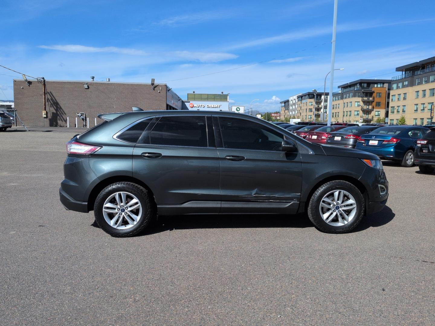 2015 GRAY Ford Edge SEL (2FMTK4J87FB) with an V6, 3.5L engine, Automatic transmission, located at 10890 W. Colfax Ave., Lakewood, CO, 80215, (303) 274-7692, 39.739914, -105.120132- Photo#3