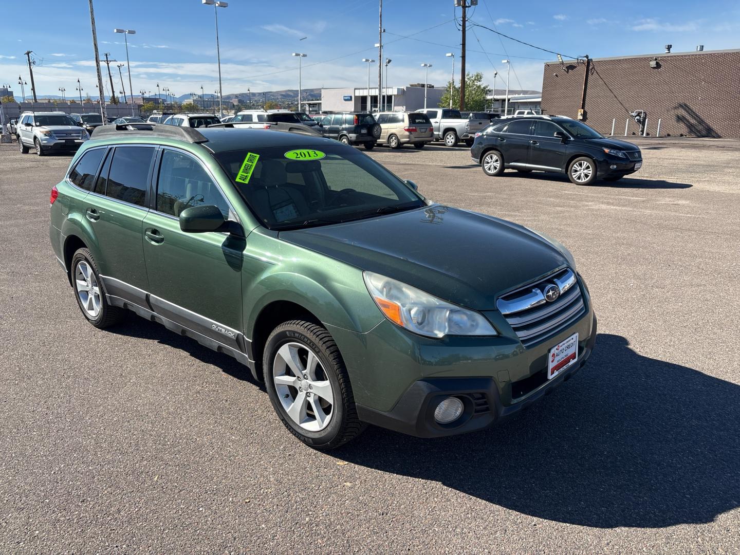 2013 GREEN /ACTUAL Subaru Outback Premium (4S4BRCCC4D3) with an 4 Cyl, 2.5L engine, Automatic transmission, located at 10890 W. Colfax Ave., Lakewood, CO, 80215, (303) 274-7692, 39.739914, -105.120132- Photo#2