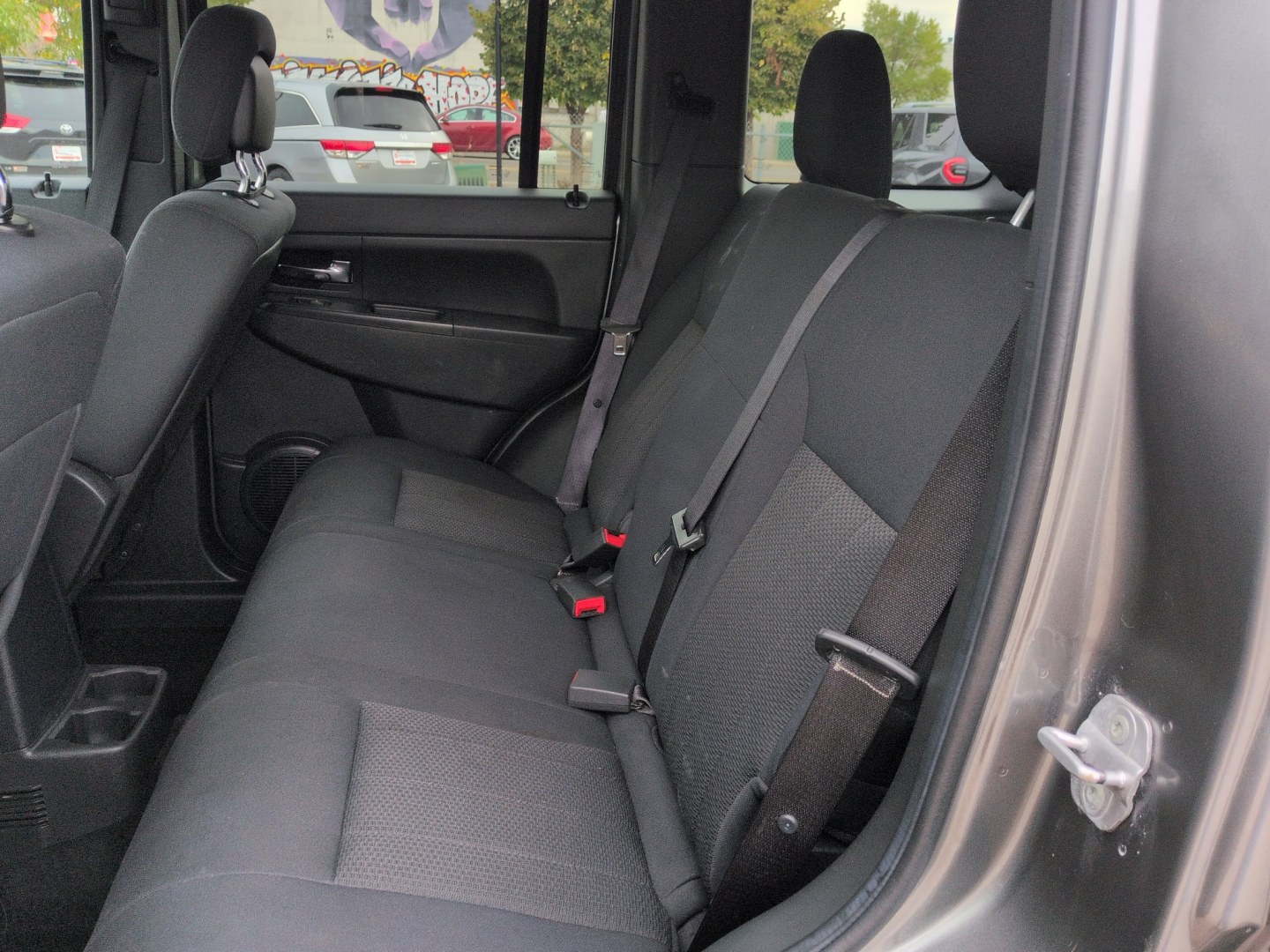 2012 GRAY Jeep Liberty Sport (1C4PJMAKXCW) with an V6, 3.7L engine, Automatic transmission, located at 10890 W. Colfax Ave., Lakewood, CO, 80215, (303) 274-7692, 39.739914, -105.120132- Photo#15